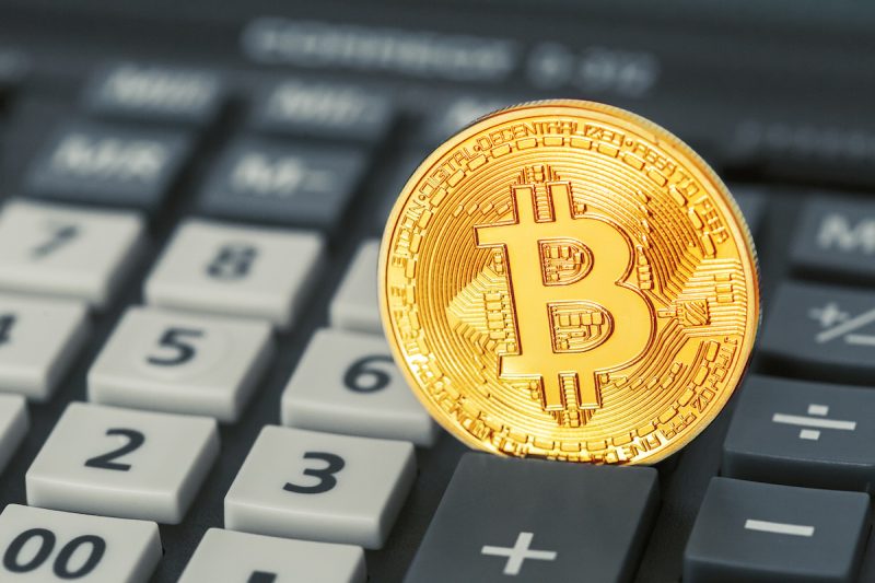 bitcoin-coin-and-calculator-2023-11-27-05-34-45-utc.jpg