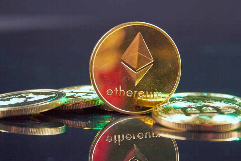 close-up-golden-ethereum-cryptocurrency-coin-on-th-2022-01-29-21-45-42-utc.jpg