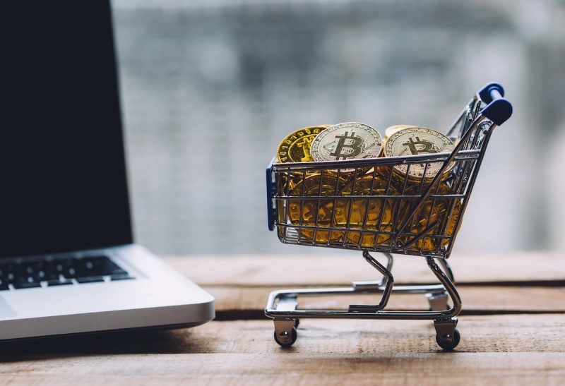 shopping-cart-filled-with-piles-of-cryptocurrency-2022-12-16-09-58-56-utc.jpg